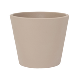 Beige Inez ceramic pot by Pottery Pots, showcasing a smooth finish and elegant design, ideal for plants and flowers.