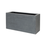 Gray Jort Fiberstone planter by Pottery Pots, showcasing a modern design with a textured finish and rounded shape.