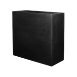 Jort Fiberstone planter in black by Pottery Pots, showcasing a sleek, modern design and textured surface.