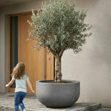 Jumbo City Bowl in Fiberstone Grau by Pottery Pots, showcasing a textured gray planter with a modern design.