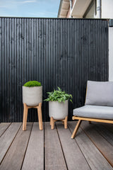 Charlie Grey Washed Feet Low rough feet planter by Pottery Pots with a textured, weathered finish. || Charlie in Feet Low & Feet High